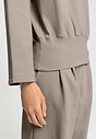 Close-up view of a women model wearing HA rose grey cotton Sweatshirt