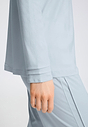 Close-up view of a women model wearing HA pastel sky cotton L/SLV Pajama