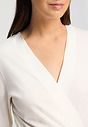 Close-up view of a women model wearing HA off white cotton Robe 115cm
