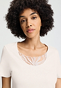 Close-up view of a women model wearing HA off white cotton S/SLV Nightdress 100cm