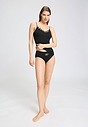 Full-body view of a women model wearing HA black cotton Midi Briefs