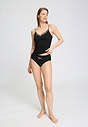 Full-body view of a women model wearing HA black cotton Spaghetti Top