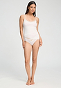 Full-body view of a women model wearing HA off white cotton Spaghetti Top