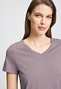Close-up view of a women model wearing HA stormy rose modal/viscose/tencel S/SLV Shirt