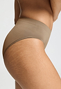 Close-up view of a women model wearing HA suede camel microfibre Midi Briefs