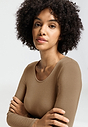 Close-up view of a women model wearing HA suede camel modal/viscose/tencel L/SLV Shirt