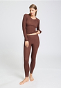 Full-body view of a women model wearing HA cinnamon wool L/SLV Shirt