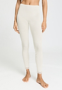 Front view of a women model wearing HA misty white wool Leggings