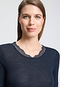 Close-up view of a women model wearing HA deep navy wool S/SLV Shirt