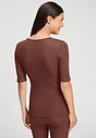 Back view of a women model wearing HA cinnamon wool S/SLV Shirt