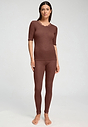 Full-body view of a women model wearing HA cinnamon wool S/SLV Shirt