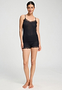 Full-body view of a women model wearing HA black wool Spaghetti Top