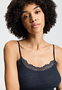 Close-up view of a women model wearing HA deep navy wool Spaghetti Top