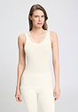 Front view of a women model wearing HA misty white wool Tank Top