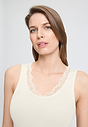 Close-up view of a women model wearing HA misty white wool Tank Top