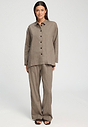 Full-body view of a women model wearing HA earthy woven cotton Blouse