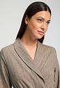 Close-up view of a women model wearing HA earthy woven cotton Robe 115cm