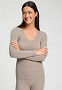 Front view of a women model wearing HA rose grey wool L/SLV Shirt