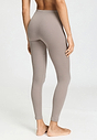 Back view of a women model wearing HA rose grey wool Leggings