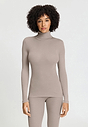 Front view of a women model wearing HA rose grey wool Turtle-Neck Shirt