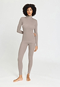 Full-body view of a women model wearing HA rose grey wool Turtle-Neck Shirt