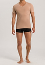 Full-body view of a men model wearing Hanro neutral cotton S/SLV Shirt V-Neck