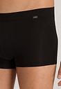Close-up view of a men model wearing HA deep black modal/viscose/tencel Pants