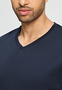 Close-up view of a men model wearing HA deep navy cotton L/SLV Pajama