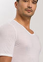 Close-up view of a men model wearing HA white cotton S/SLV Shirt
