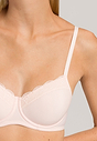 Close-up view of a women model wearing Hanro powder cotton Padded Bra