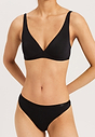 Front view of a women model wearing Hanro black cotton Soft Cup Bra
