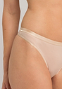 Close-up view of a women model wearing Hanro beige cotton Thong