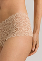 Close-up view of a women model wearing Hanro beige microfibre Panty