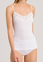 Front view of a women model wearing Hanro white cotton Spaghetti Top