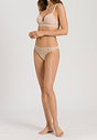Full-body view of a women model wearing Hanro beige microfibre Thong