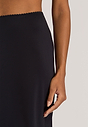 Close-up view of a women model wearing HA black modal/viscose/tencel Half Slip