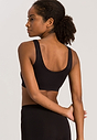 Back view of a women model wearing Hanro black microfibre Crop Top