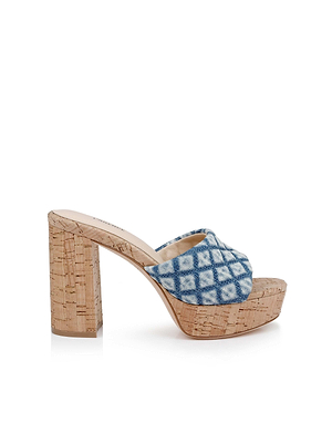 The Gabriell Platform Sandal features blue and white tie-dye crisscross straps, a thick cork block heel and sole, and is shown on a plain white background.