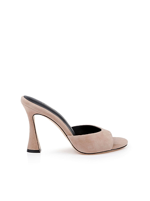 The Avery Suede Open-Toe Mule, a cappuccino suede sculpted stiletto with an open toe and flared heel, is shown in profile against a white background.