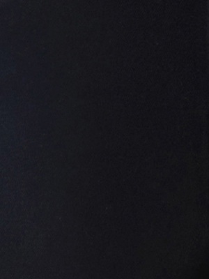 A solid, dark surface with a subtle textured appearance, mostly black with faint hints of lighter shading toward the left side.