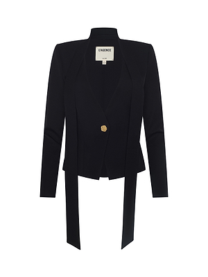 The Romy Tie Neck Blazer by L’AGENCE is a black tailored women’s jacket with long sleeves, notched lapel collar, single gold button closure, and two front panels. The label reads “L’AGENCE.” Set against a white background.