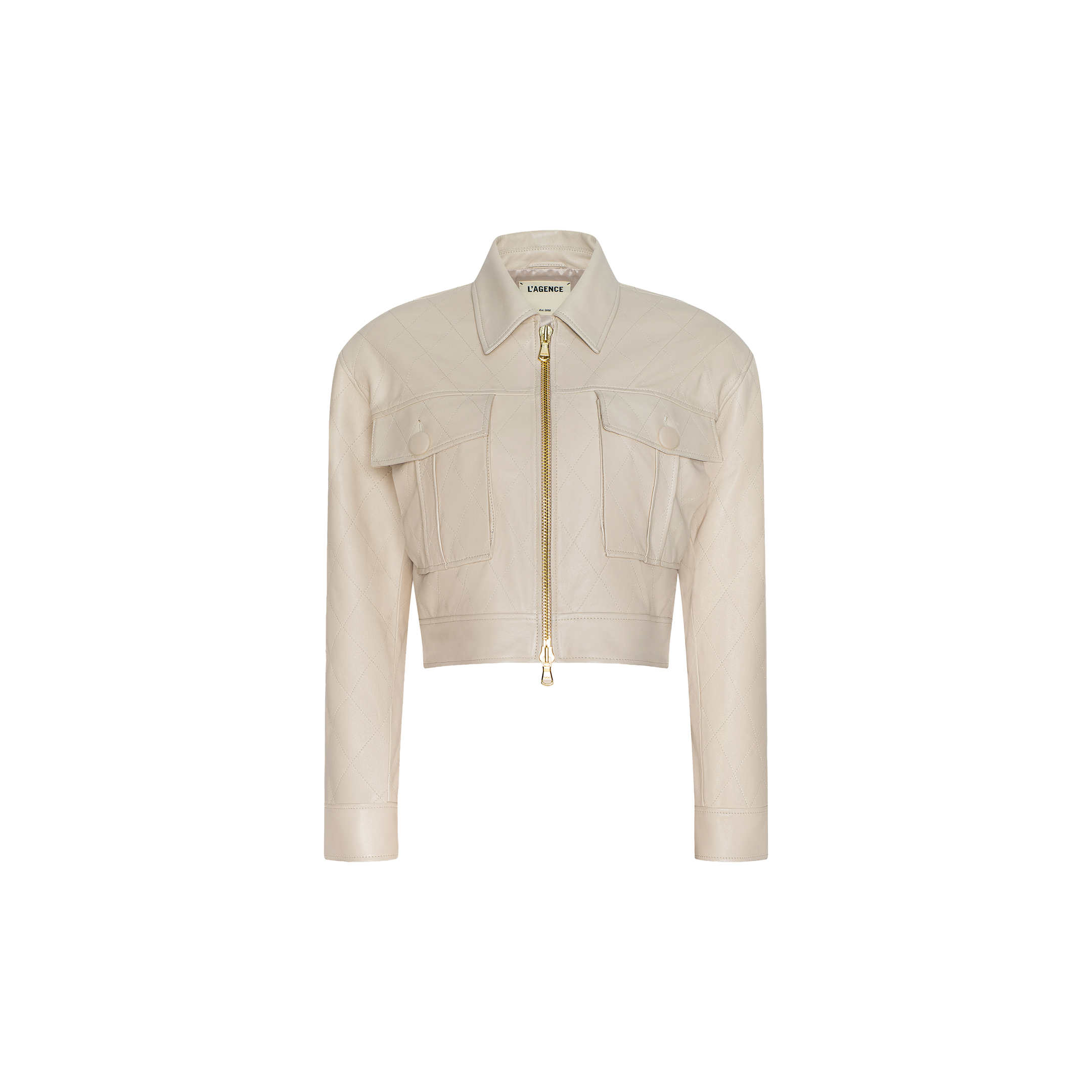 The Micah Oversized Leather Jacket features a cropped silhouette in light beige leather, with a gold zipper, two front flap pockets, long sleeves, and a shirt-style collar. The background is plain white.