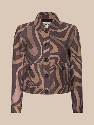 The Nyx Cropped Jacket is a relaxed fit, long-sleeve cotton button-up with a collar, bold brown and beige abstract swirl print, and two front flap pockets.