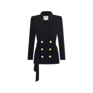 The Aven Wrap Blazer is a black double-breasted blazer featuring gold buttons, long sleeves, a notched lapel, and a matching fabric belt that ties at the waist—an elegant addition to women’s suiting for a polished, modern look.