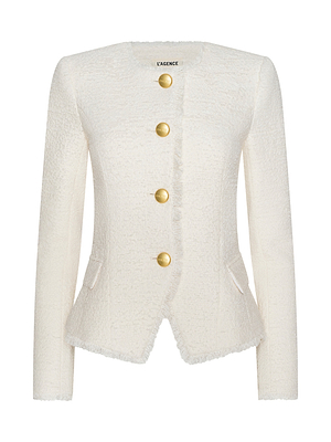 The Nerina Tweed Blazer is a statement piece with its white, collarless design and gold buttons.