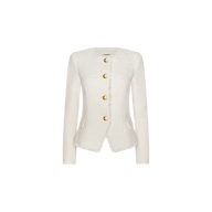 The Nerina Tweed Blazer is a white, collarless blazer featuring long sleeves, gold buttons down the front, and two small flap pockets. Crafted from slightly textured fabric, this tailored piece offers a sleek silhouette and stands out as a true statement item. Displayed on a plain white background.