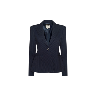 The Therese Blazer is a tailored dark navy pinstripe jacket featuring a single-button closure, notched lapels, and an elegant peplum hem, showcased against a plain white background.