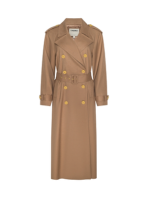 The Brinley Oversized Trench Coat is a long, tan double-breasted style featuring a waist belt, gold buttons, epaulets, and buttoned cuffs, shown on a white background.