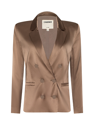 The Sena Silk Blazer is a women’s brown, double-breasted blazer made from smooth silk charmeuse, featuring peak lapels, two front flap pockets, and four buttons. Displayed on a white background with the L’AGENCE label inside.