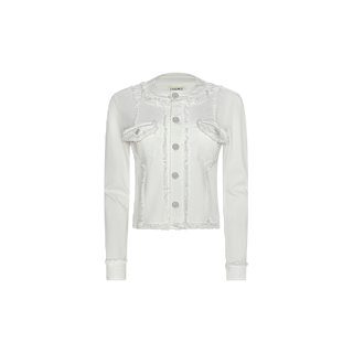The Yarin Collarless Fray Jacket is a white, long-sleeve jean jacket featuring a collarless silhouette, frayed trim, two front pockets, and textured detailing at the hem. Crafted from stretch denim, it is displayed on a plain white background.